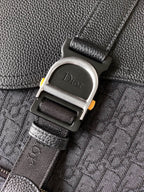 Dior logo buckle on dark leather and monogram strap