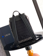 Dior monogram backpack open view with padded black interior