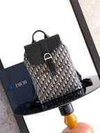 Dior monogram backpack with black flap and silver-tone buckle