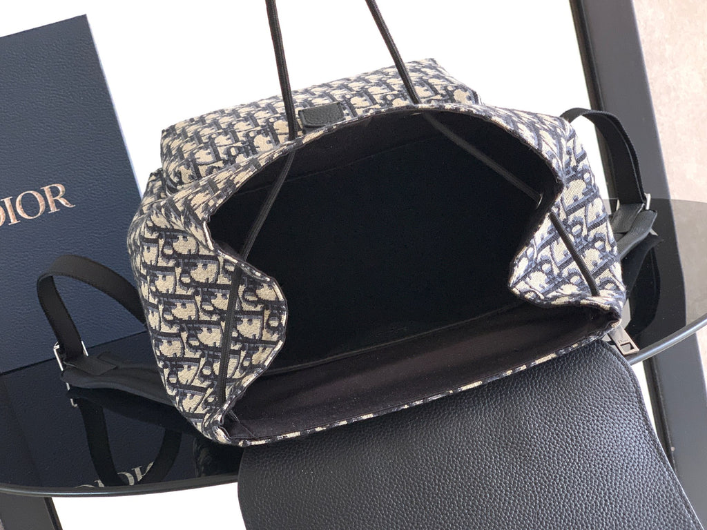 Dior monogram backpack with black interior lining and top opening