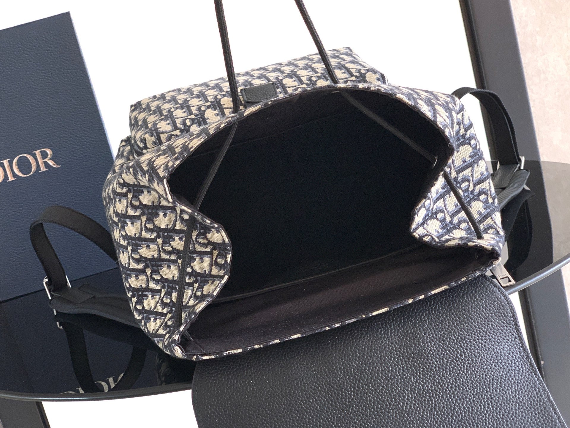 Dior monogram backpack with black interior lining and top opening