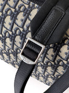 Dior logo buckle with black adjustable strap on monogram canvas