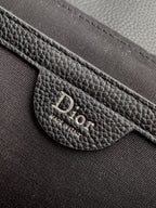 Dior bag logo patch on textured leather interior pocket