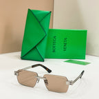 Bottega Veneta sunglasses with tan lenses, silver-tone frames, and tortoise-detail temples