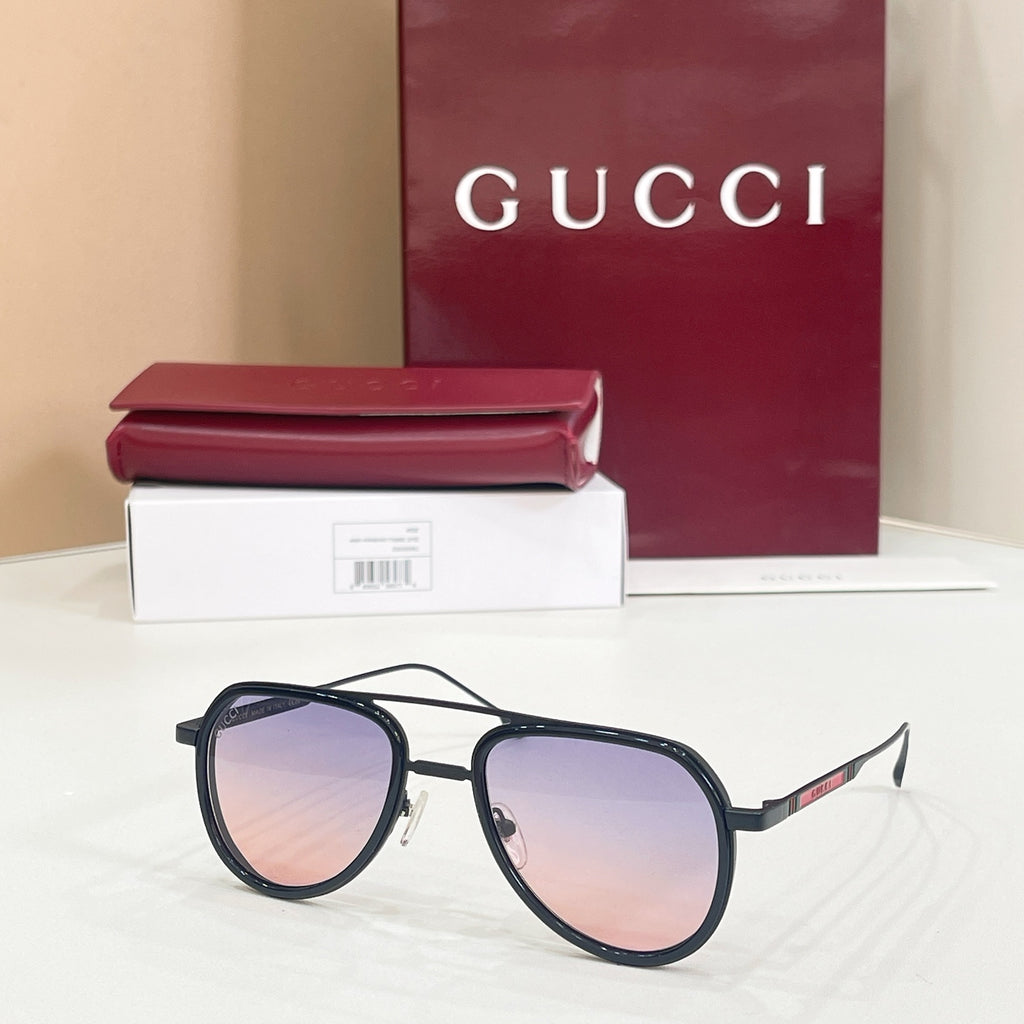 Gucci sunglasses with black frame and pink-to-purple gradient lenses