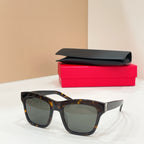 YSL sunglasses with tortoise frame and dark gray lenses