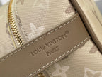 Louis Vuitton bag interior label on beige textured leather panel