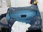 Louis Vuitton bag with dark navy monogram exterior and light blue interior lining