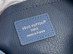 Blue pebbled leather label with Louis Vuitton Paris and made in France