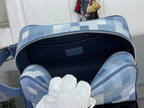 Blue check bag interior with dark lining and zip closure