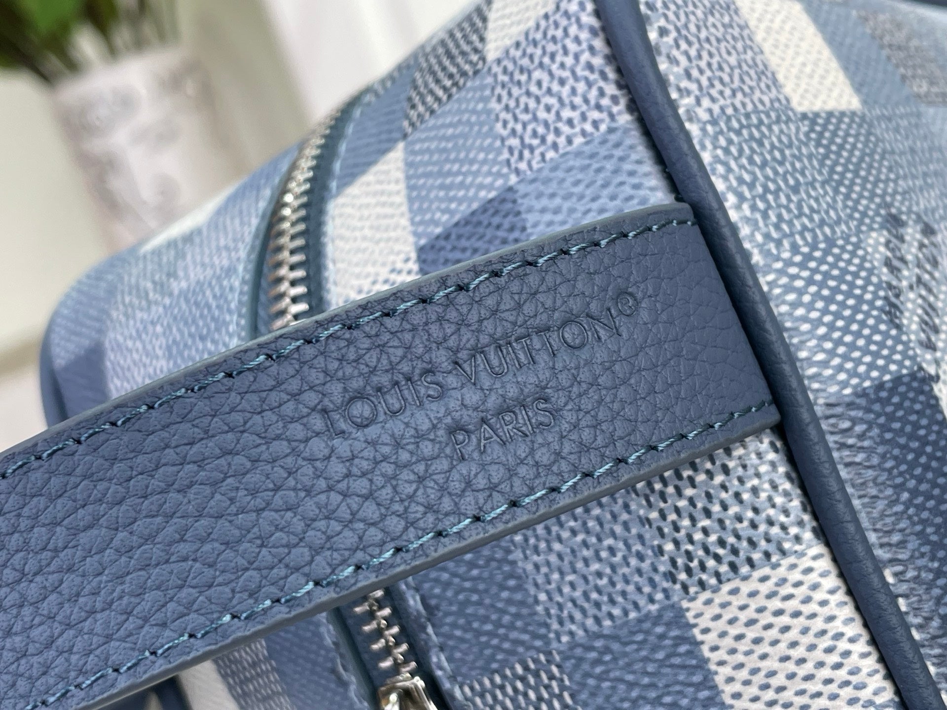 Dark blue leather strap panel with Louis Vuitton Paris embossing