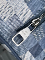 Metal zipper pull with Louis Vuitton engraving and strap ring