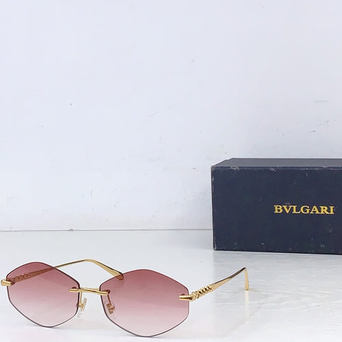 Gold-rim round sunglasses with pink lenses and slim metal arms