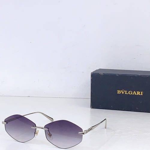 Gold-rim round sunglasses with purple gradient lenses and metal side arms