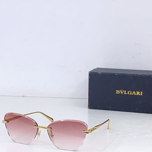 Bvlgari sunglasses with gold metal frame and pink tinted lenses, front angle.