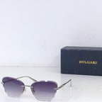 Bvlgari sunglasses with gold metal frame and purple tinted lenses, front angle.