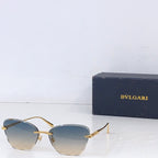 Bvlgari sunglasses with gold metal frame and light gold tinted lenses, front angle.