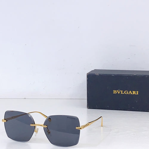 Bvlgari sunglasses with gold frame and dark blue gradient lenses, side view
