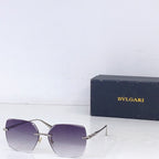Bvlgari sunglasses with gold frame and purple gradient lenses, rectangular shield shape
