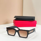 YSL glasses, black square frame with clear tan lenses and gold logo detail