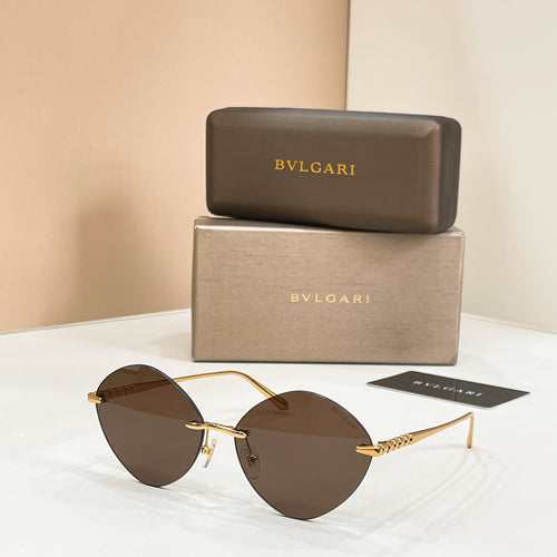 Sunglasses with gold-tone frame and dark brown round lenses