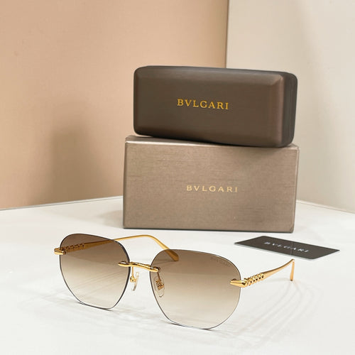 Round Bvlgari sunglasses with dark lenses and gold-tone frames