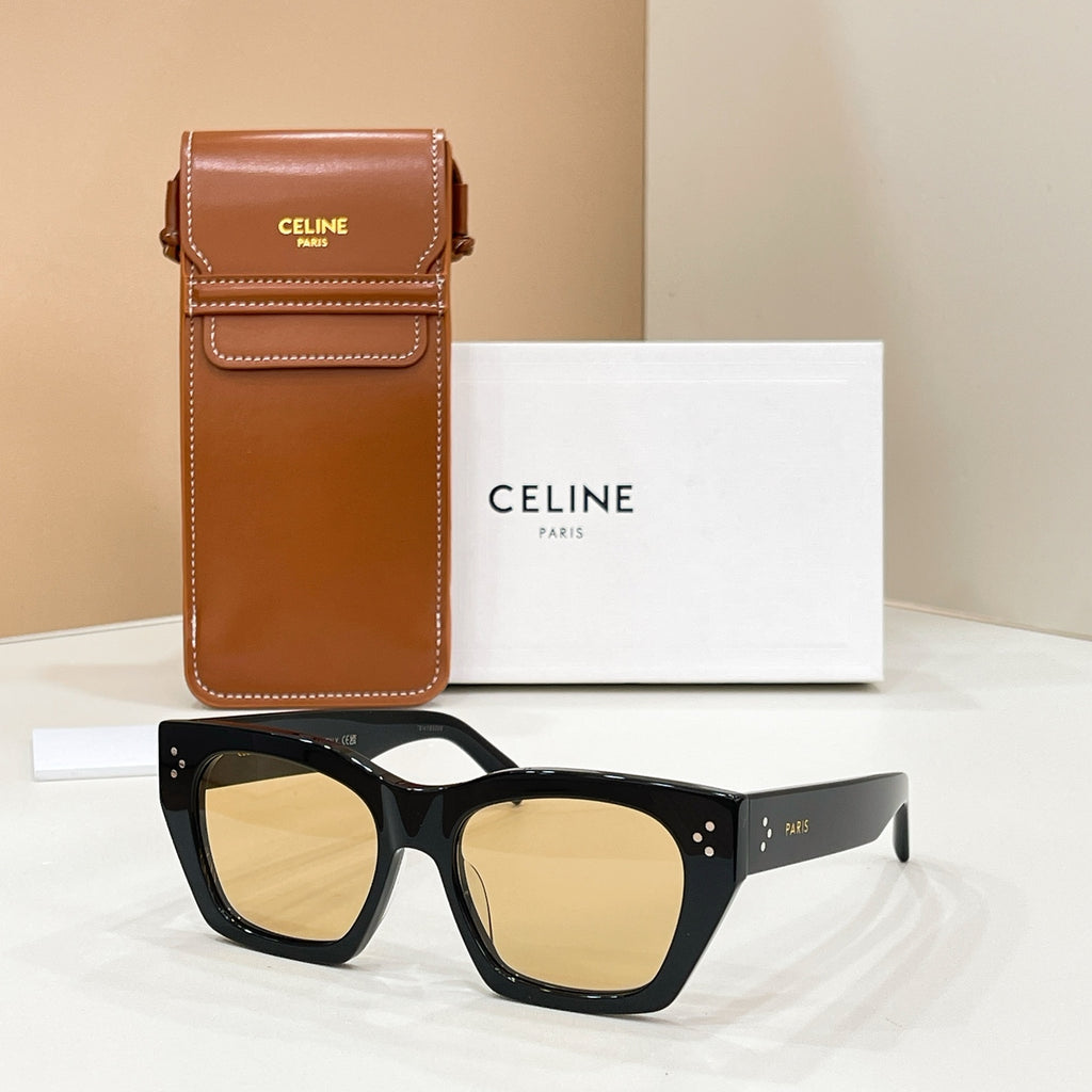 Celine sunglasses with square black frames and amber-tinted lenses