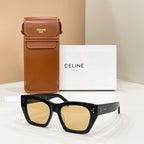 Celine sunglasses with square black frames and amber-tinted lenses