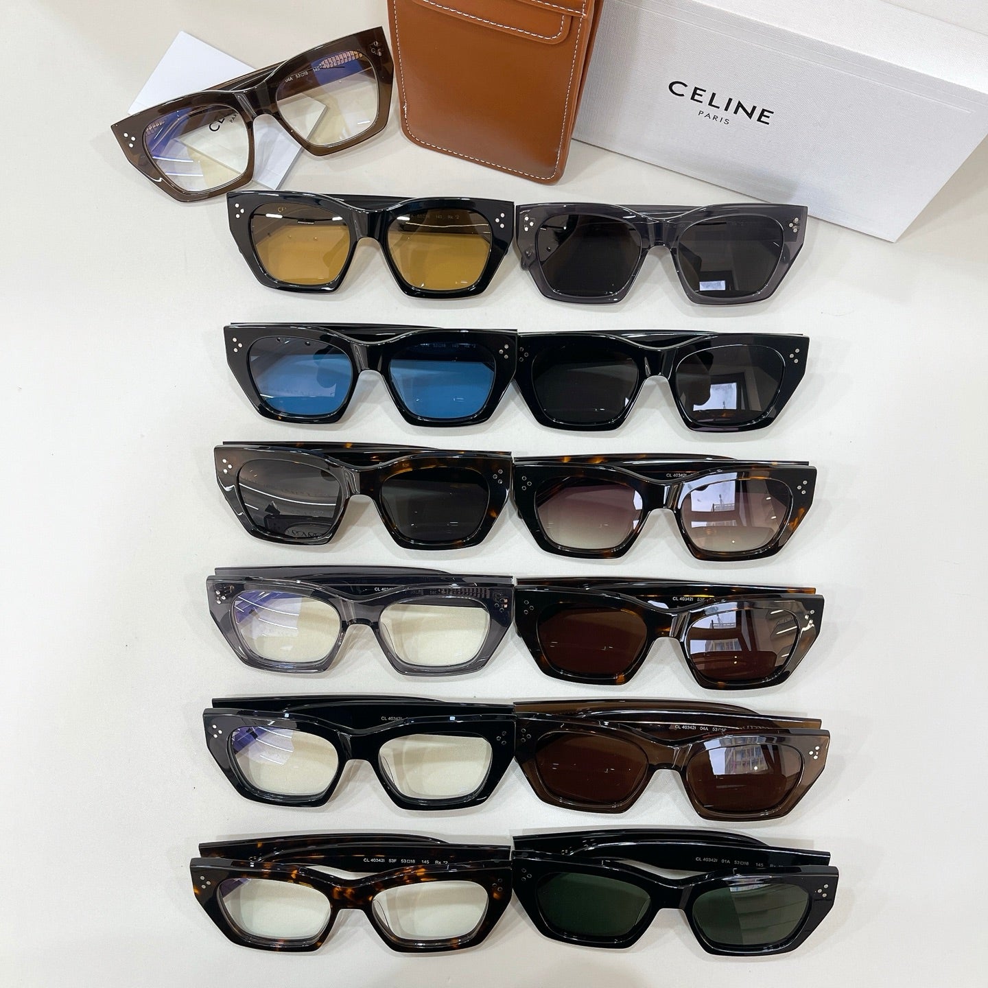 Celine glasses assortment with clear lenses in multiple colors, plus leather case.