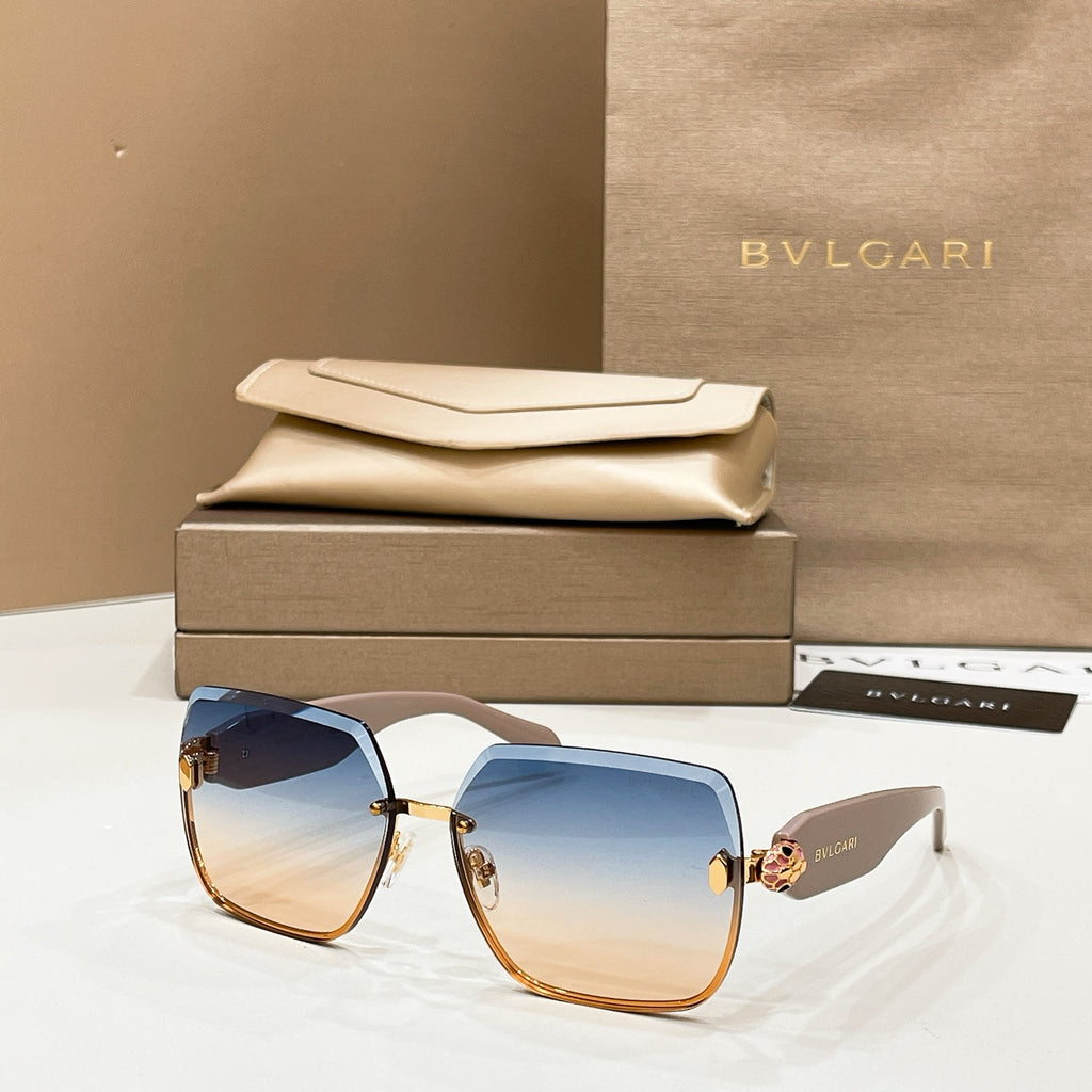 Bvlgari sunglasses with blue-to-brown tinted lenses and gold-toned frame