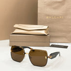 Bvlgari sunglasses with tortoise frame and dark brown tinted lenses, gold details