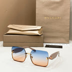 Bvlgari square sunglasses with light blue lenses and gold-tone metal frame