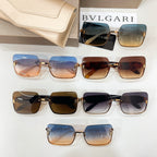 Bvlgari sunglasses display with several square frames in blue, brown, and black