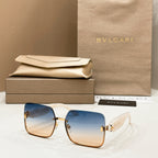 Bvlgari square sunglasses with blue lenses and gold-tone metal frame