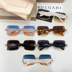 Bvlgari sunglasses set with square frames in blue and tortoise tones, jeweled accents