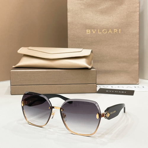 Bvlgari sunglasses with tortoiseshell frames, gold accents, and dark gradient lenses