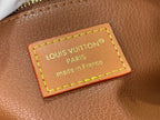 Louis Vuitton leather brand patch with made in France text and gold stitching