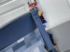 Blue Damier-check pouch corner with metal zipper and leather trim
