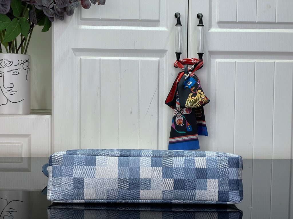 Blue Damier-check pouch with long top zip opening and hanging charm