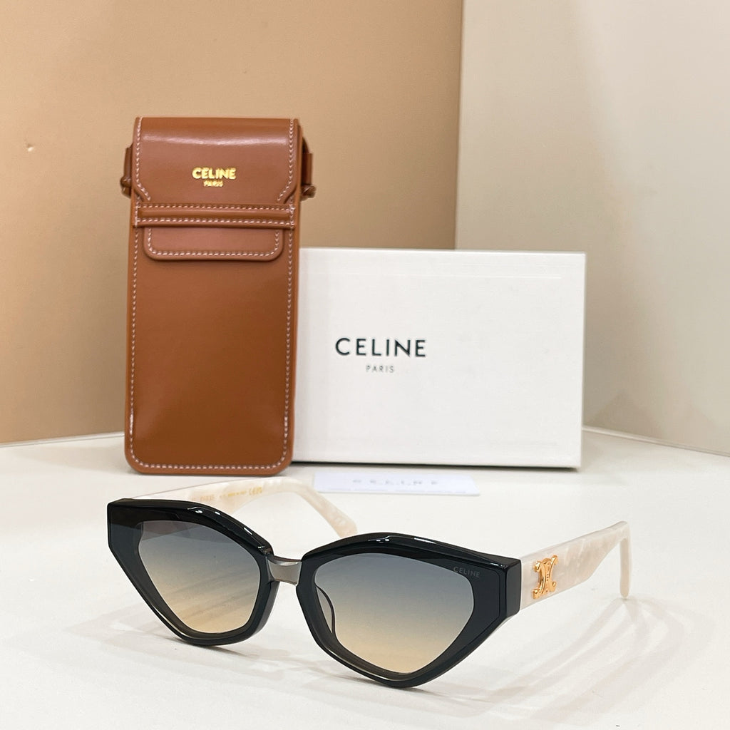 Celine black cat-eye sunglasses with gold logo on temples and gradient tinted lenses