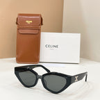 Celine black cat-eye sunglasses with gold logo on temples and dark tinted lenses