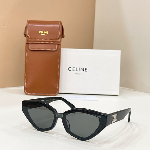 Celine black cat-eye sunglasses with gold logo on temples and dark tinted lenses