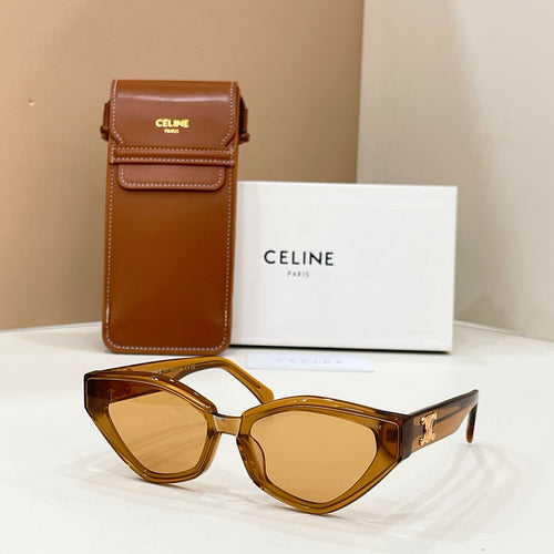 Celine amber cat-eye sunglasses with gold logo on temples and tinted lenses