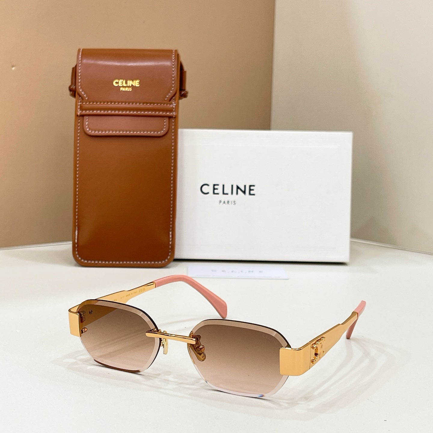 Celine sunglasses with gold-tone frame and light brown tinted lenses