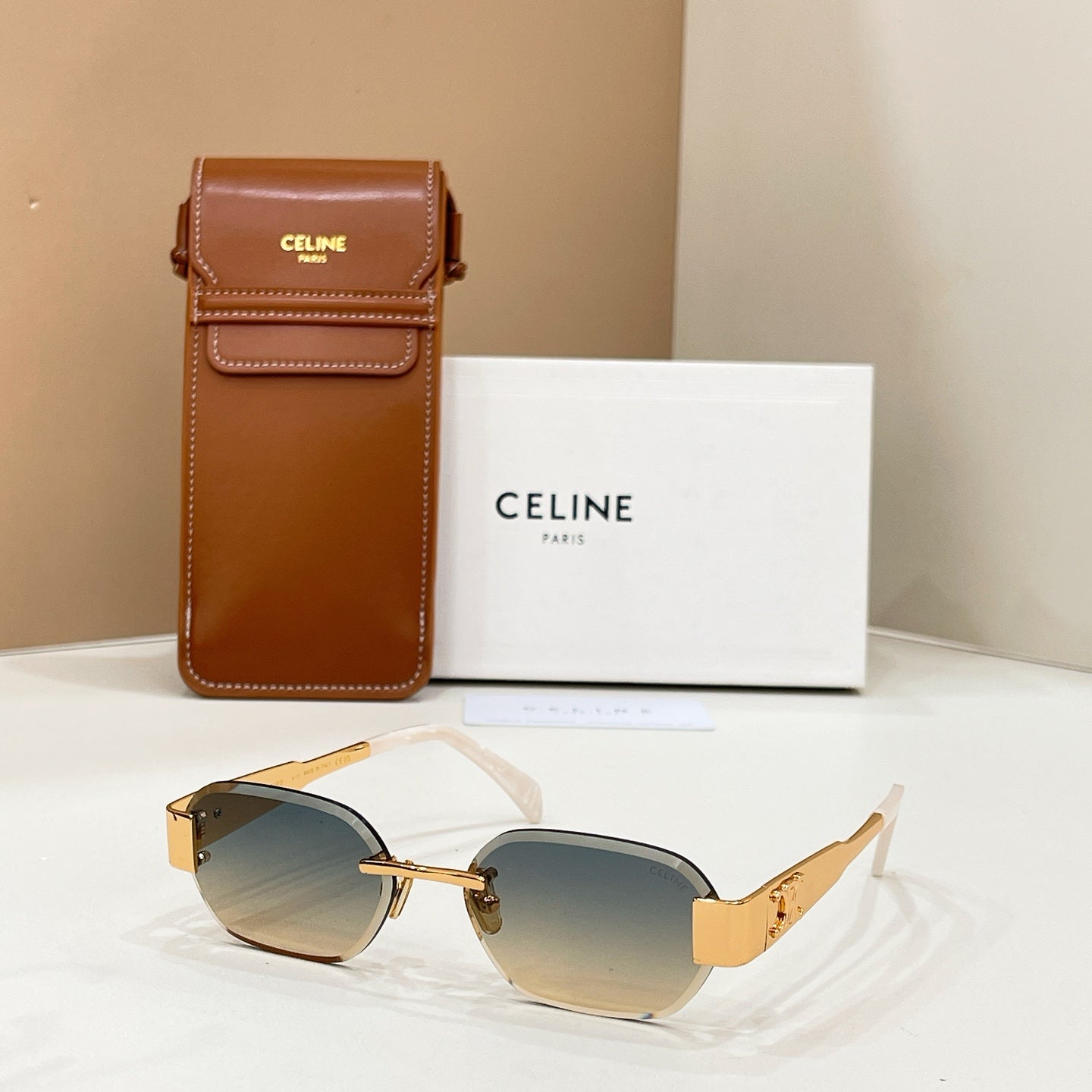 Celine sunglasses with gold-tone frame and gradient brown tinted lenses