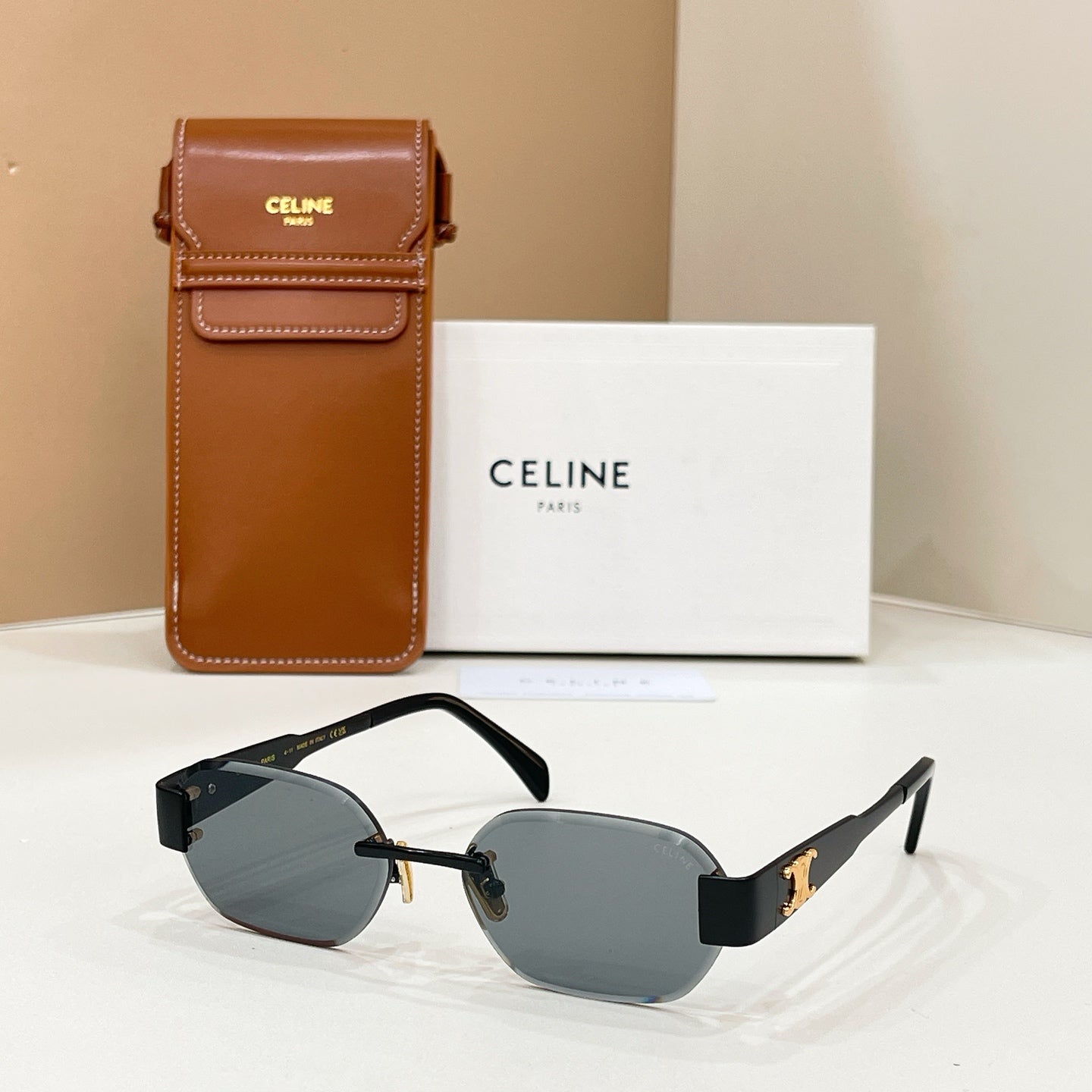 Celine sunglasses with black frame and dark gray tinted lenses