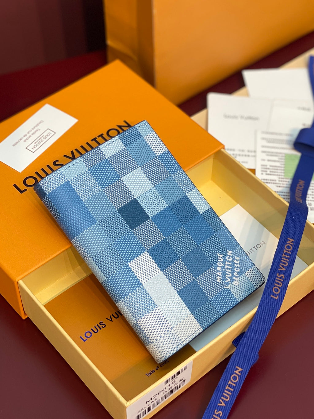 Louis Vuitton small bag in blue Damier Azur checkered canvas, folded design