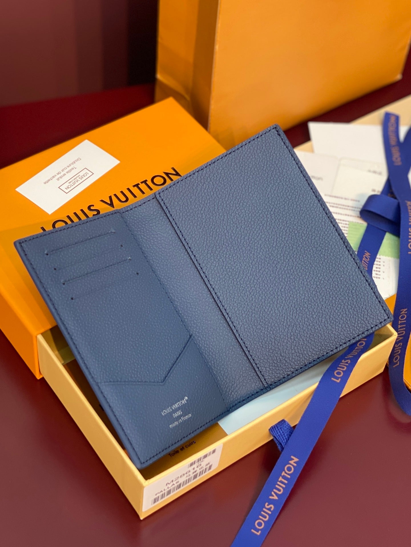 Louis Vuitton small bag in blue textured leather with open card slots