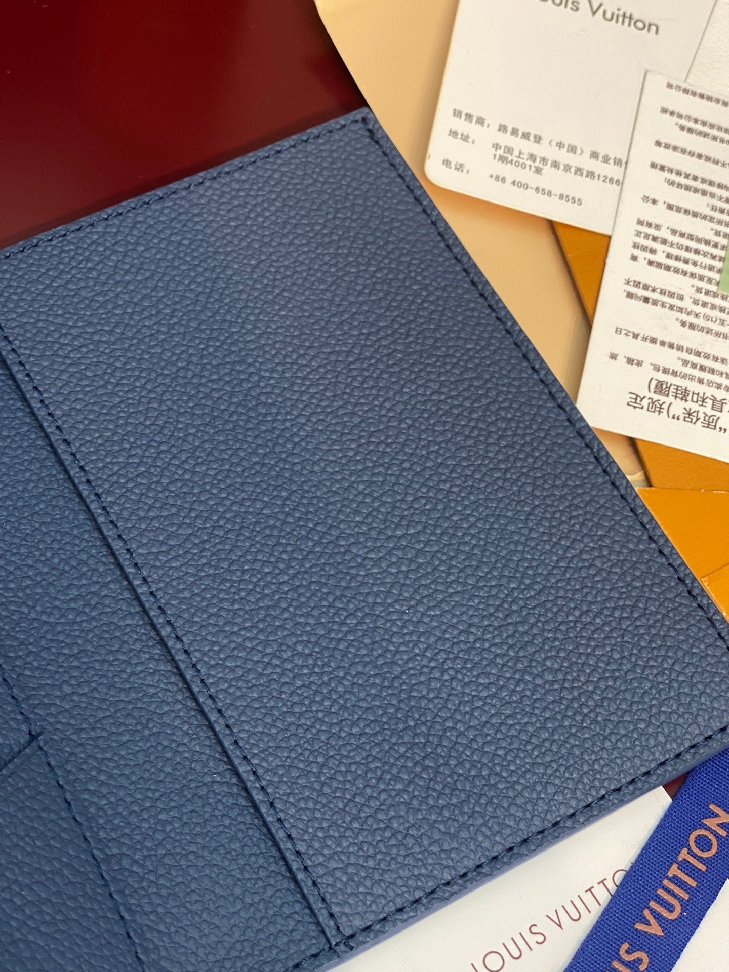 Louis Vuitton small bag in blue textured leather with smooth exterior panel