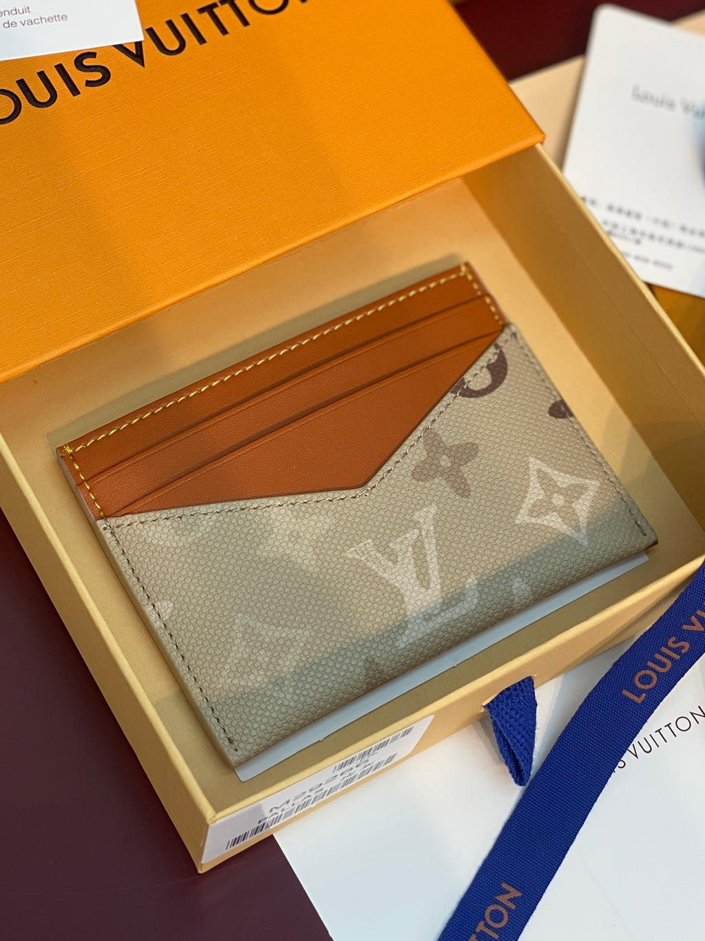 Louis Vuitton small card holder, beige monogram canvas with tan card slot and stitching